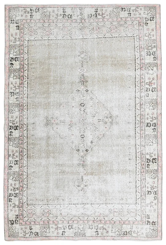 Full top view of the gray vintage Anatolian area rug with a central medallion and geometric border.