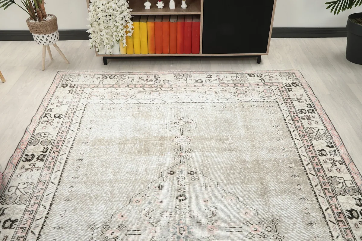 Overhead view of the rug placed in a room, capturing its full design from a higher perspective.