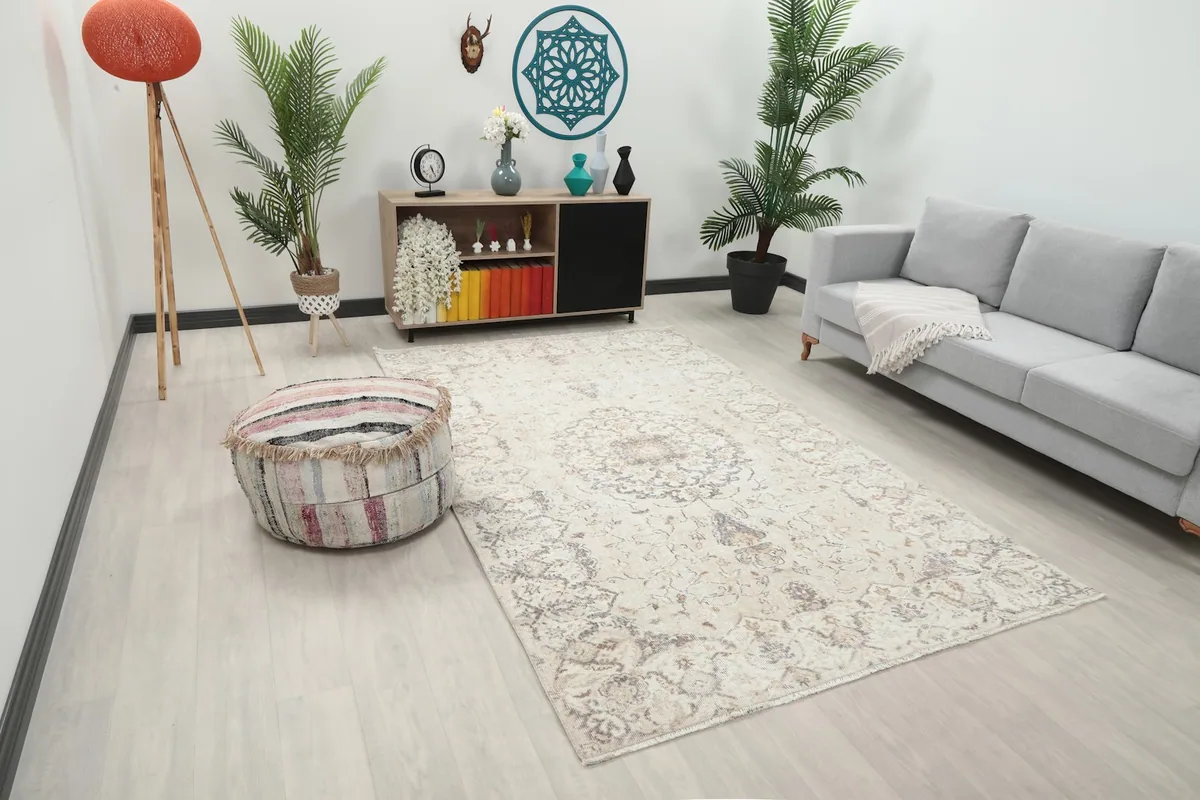 Vintage Anatolian rug in a contemporary living space, showing its size and pattern.