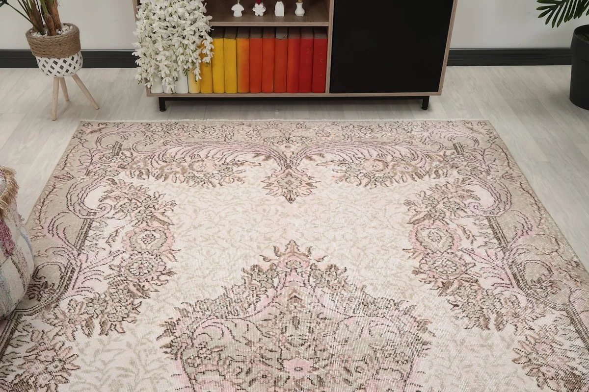 Overhead view of the rug showcasing the full floral medallion design from a higher perspective