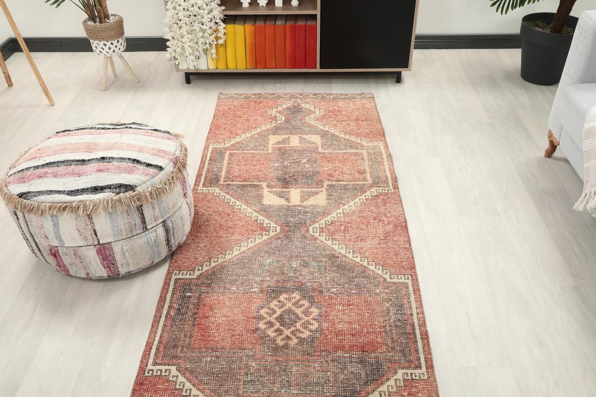 Overhead view of the Rust Gray Geometric Anatolian Runner in a room, highlighting its placement.