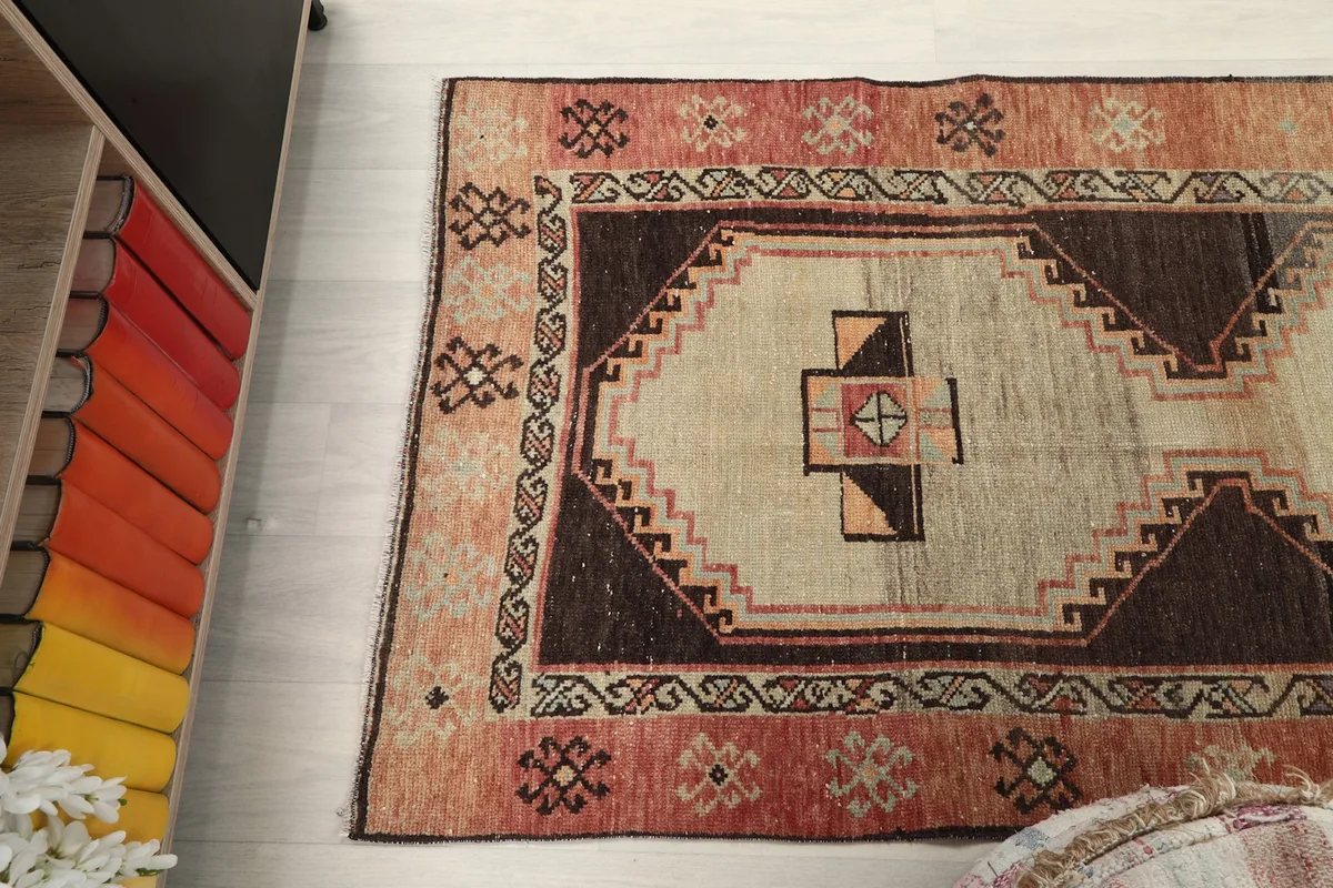 Angle view highlighting the rug's full pattern and colors in a room setting