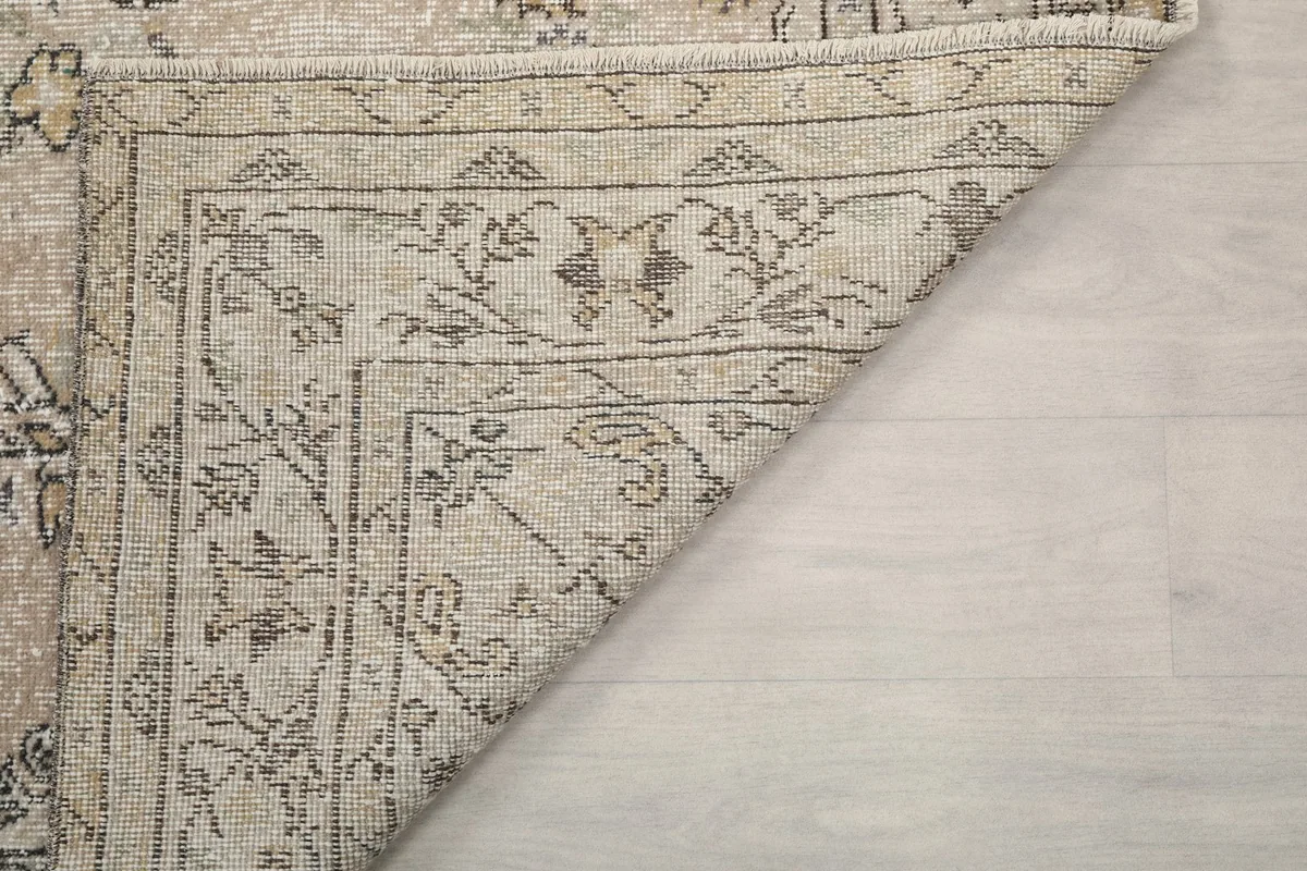 Another folded corner view, showing the construction and patina from the reverse side