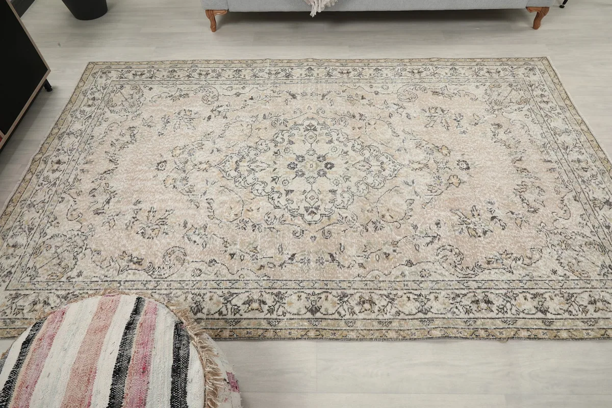 Full overhead view of the rug in a room, capturing its overall design and dimensions