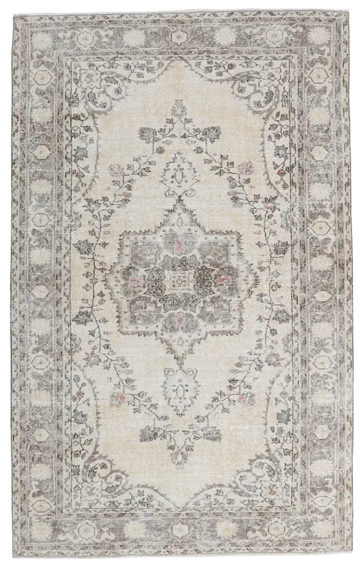 Full top view of the 6x10 beige and gray vintage Anatolian rug with a central medallion.