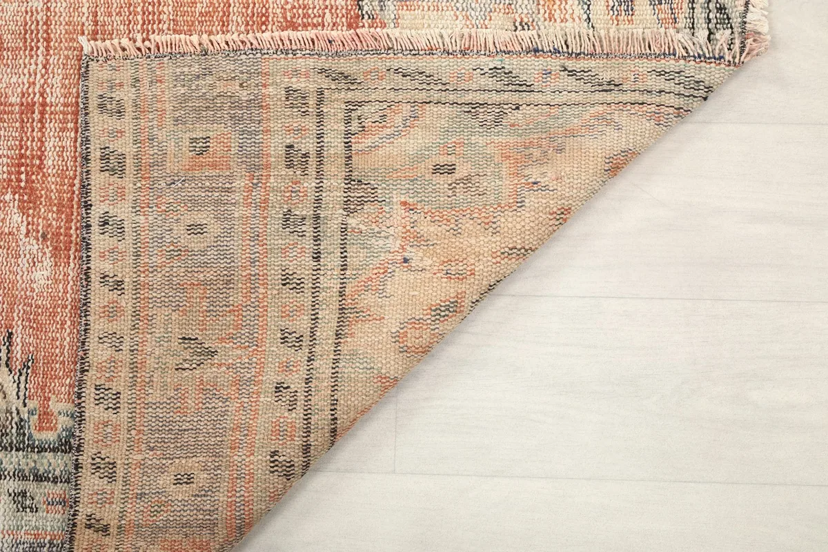 Close-up of the back of the rug, revealing the detailed knotting and foundation