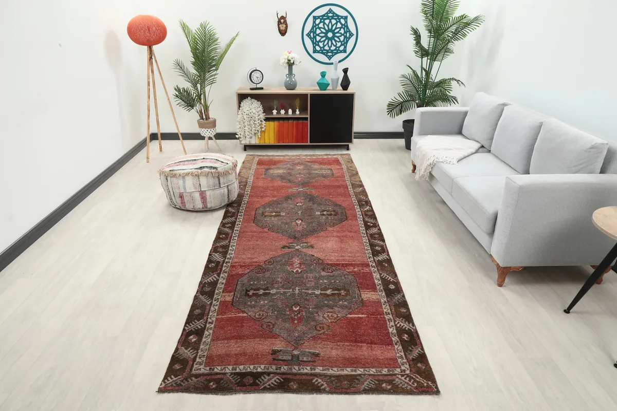 Runner rug in a modern living space, showing its length and scale next to a sofa