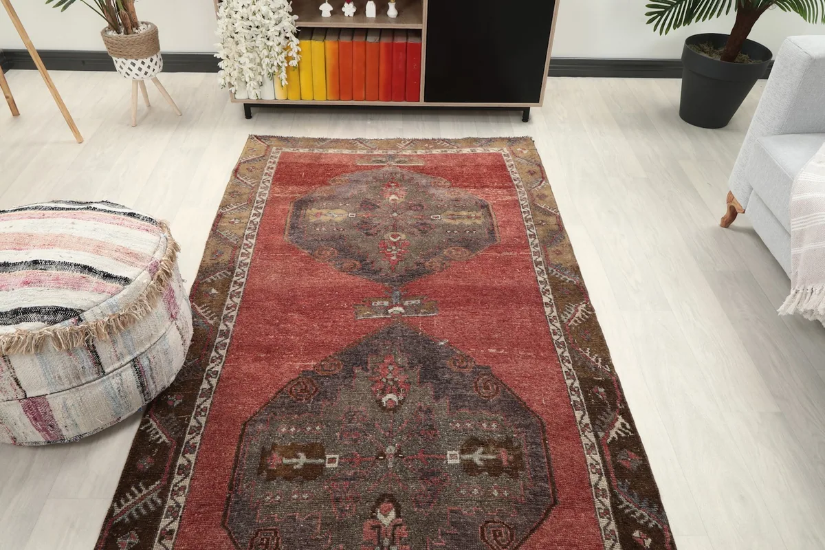 Overhead view of the runner rug placed in a room, showing its full design and context