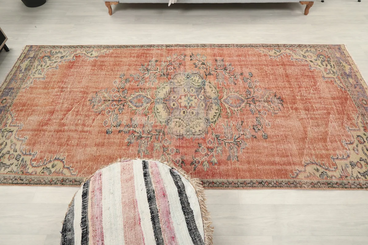 Full overhead shot of the rug in a room setting, providing a clear perspective of its dimensions