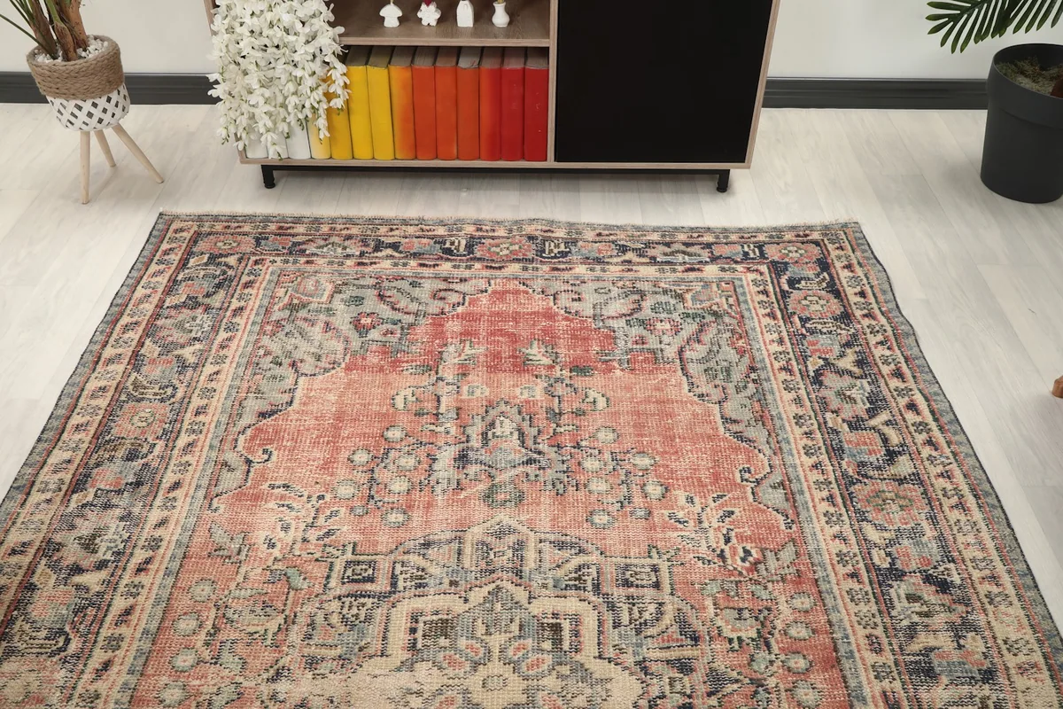 Overhead view from one end, showing the rug's full design and placement in a room