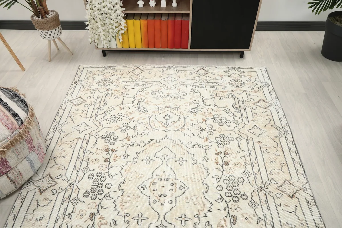 View of the rug in a room, showing its full length and width relative to furniture