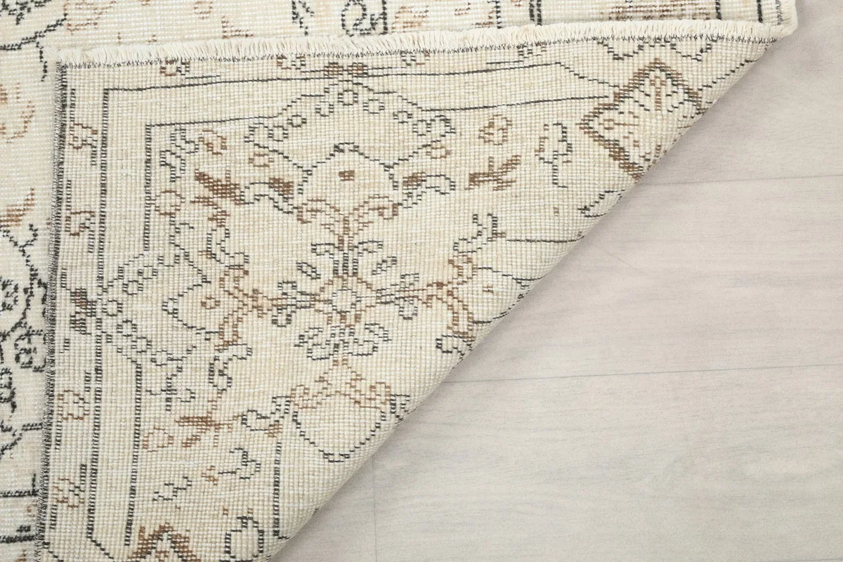 Another view of the rug's reverse side, confirming its traditional hand-knotting