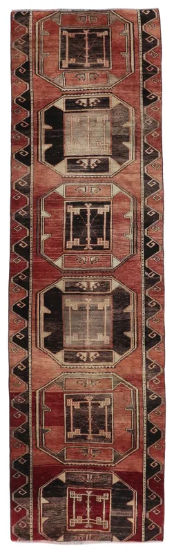 Full overhead view of the rust and black geometric Anatolian runner rug