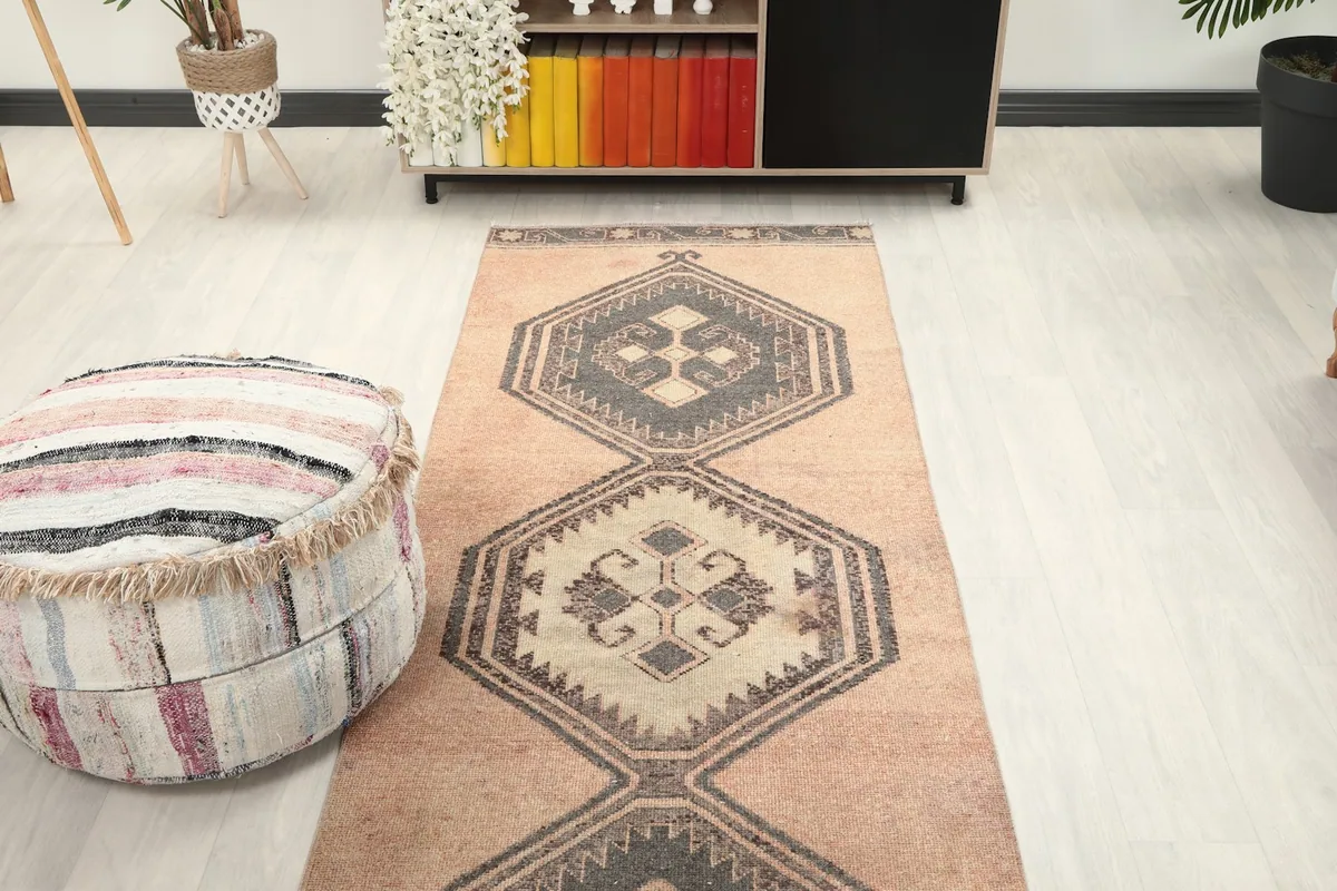 Overhead view of the runner rug in a room, showing its full design and proportion.