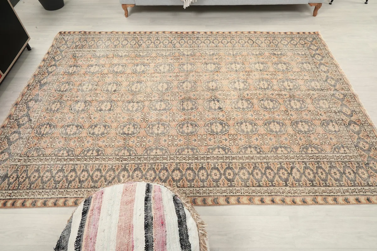 Wide shot of the rug in a room, showing its impact on the decor and scale