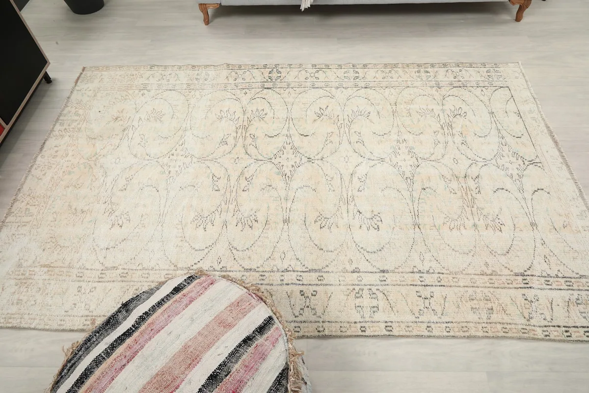 Full overhead view of the rug, emphasizing its shape and the distribution of patterns.