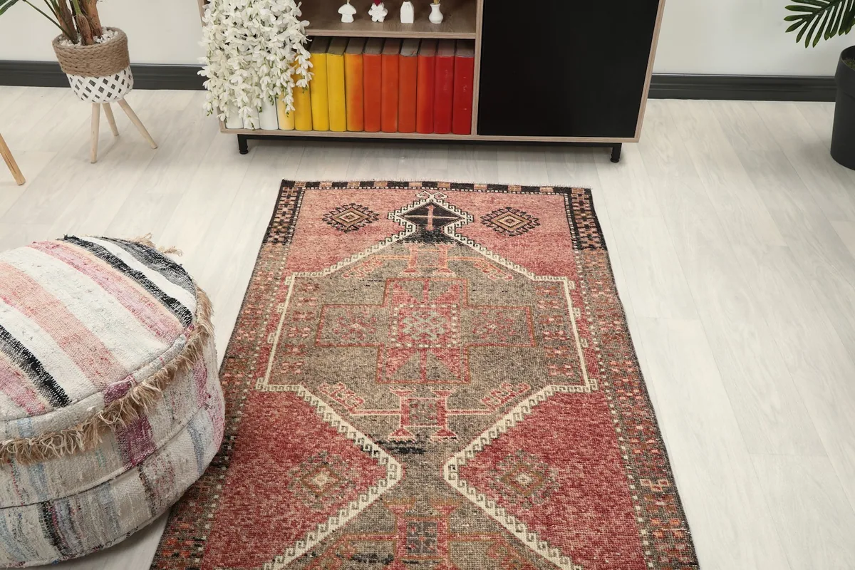 Overhead view of the runner rug in a room setting, focusing on the central design elements