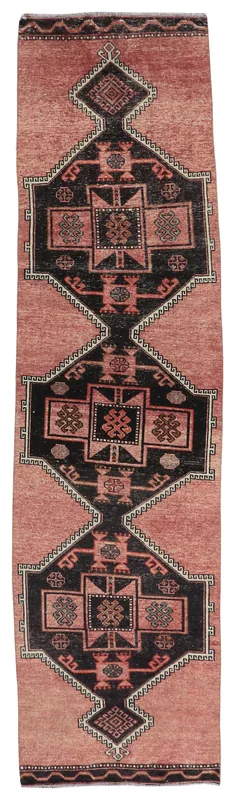 Full top view of the 2'10" x 11'4" rose and black vintage Anatolian runner rug