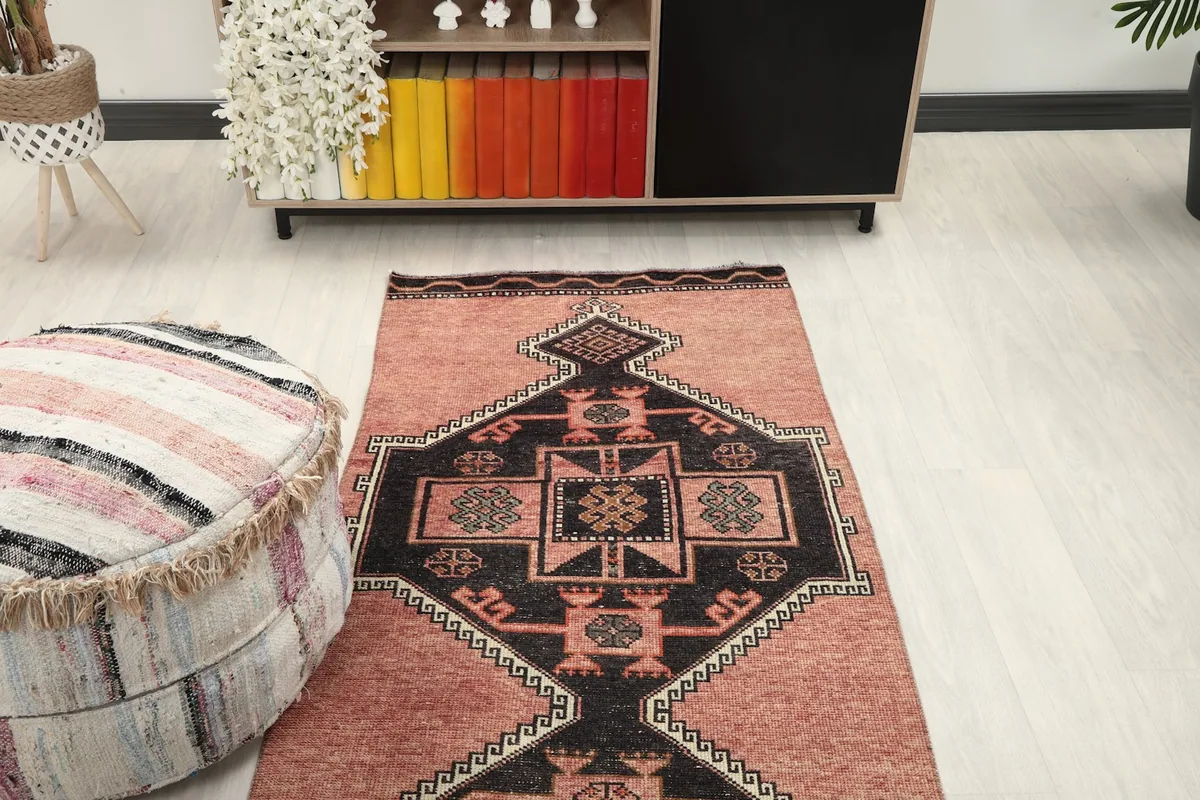 Runner rug in a room setting, showing the front end and its relation to furniture