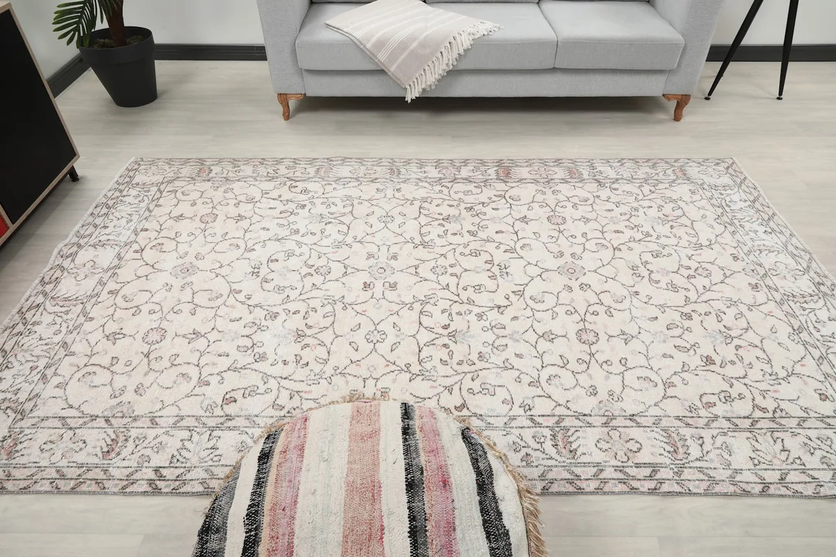 Frontal view of the rug in a living room, centered in the frame, showcasing its harmonious integration with the decor.
