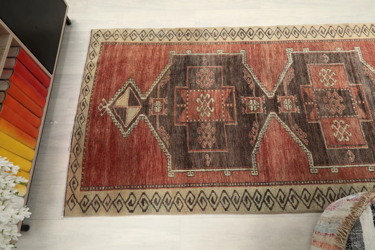 High-angle view of the runner rug, capturing the full length and repeating geometric design