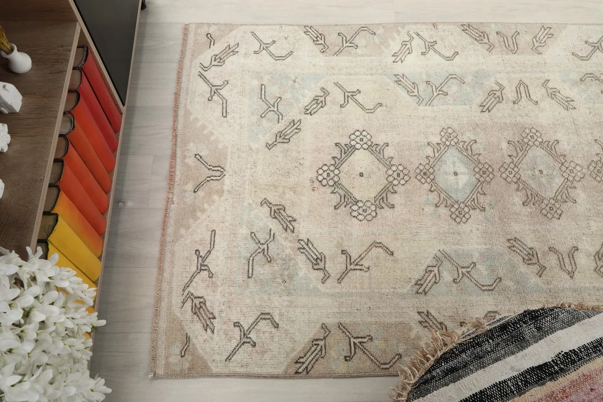 Angled view from above showing the full length of the rug and its placement in a room.