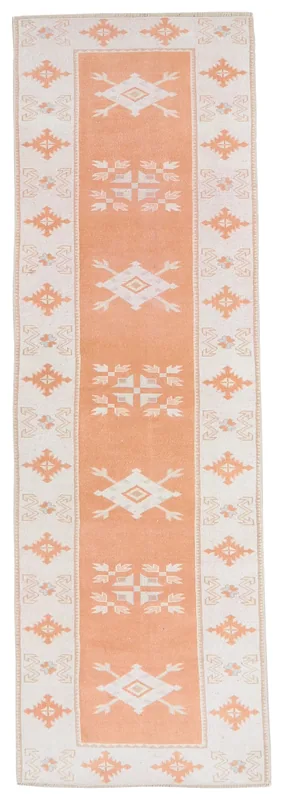 Full top view of the 2'7" x 9'0" orange and beige Anatolian runner rug on a white background.