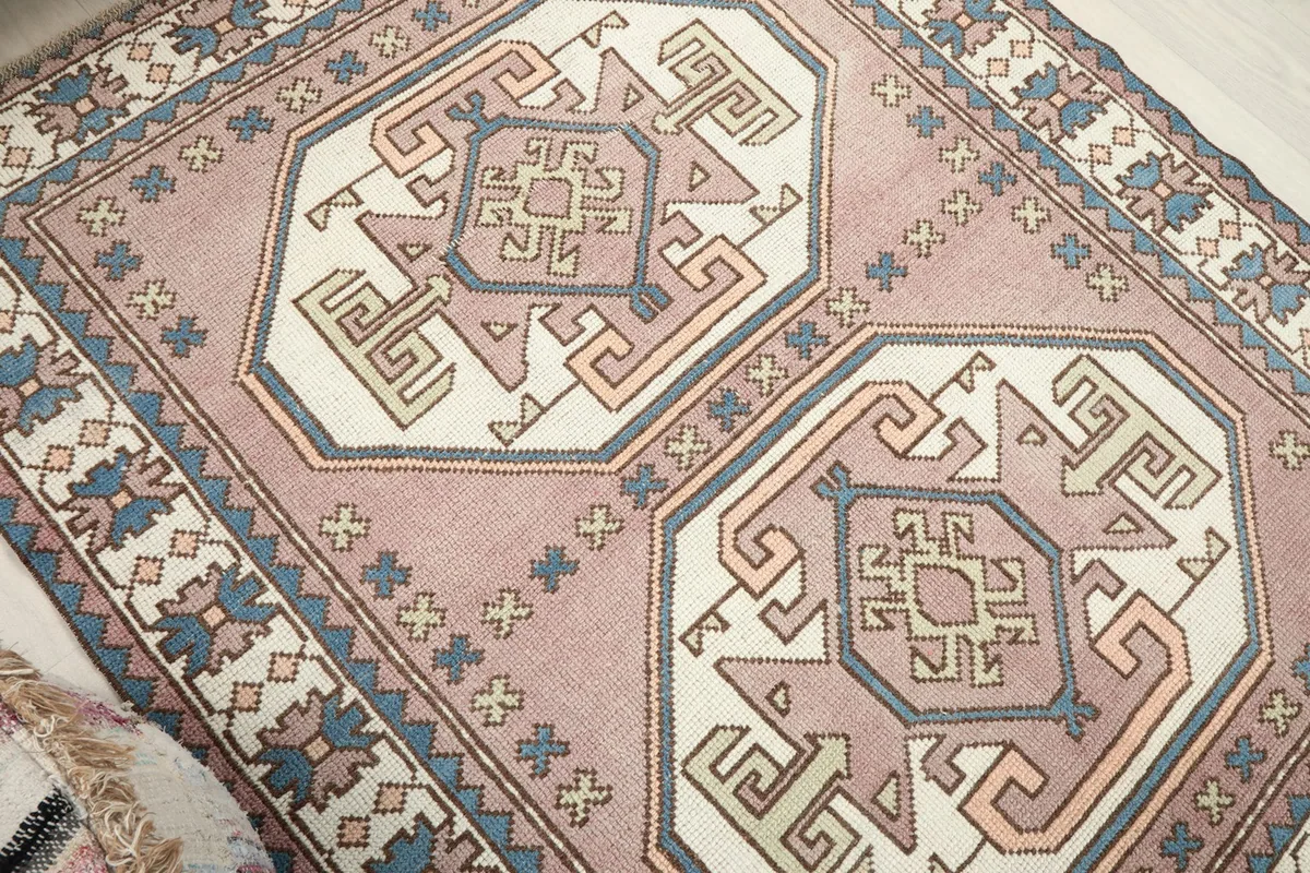 Overhead angle view highlighting the two main geometric medallions and border