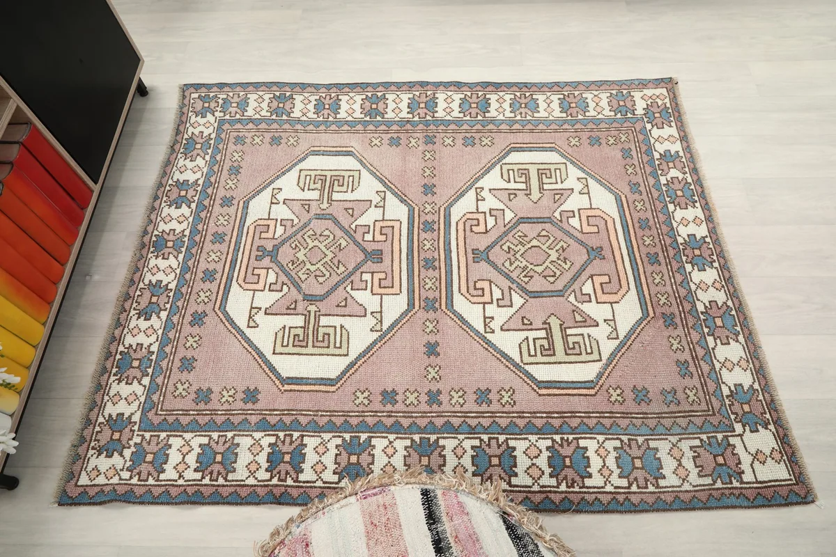 Overhead view of the rug in a room setting, showing its full rectangular shape