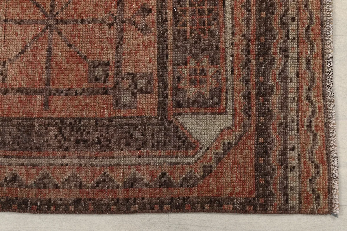 Detailed view of the complex geometric border design and corner of the Anatolian runner