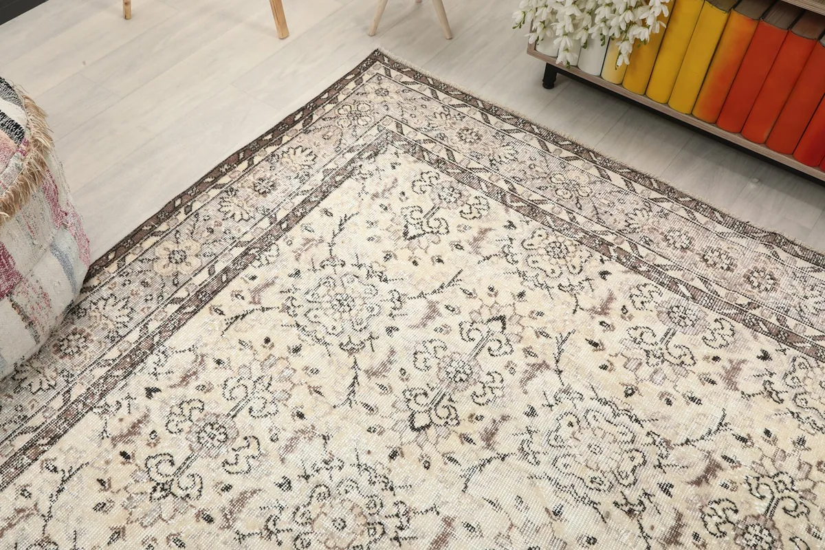 Top-down angle view highlighting the intricate patterns and border of the rug