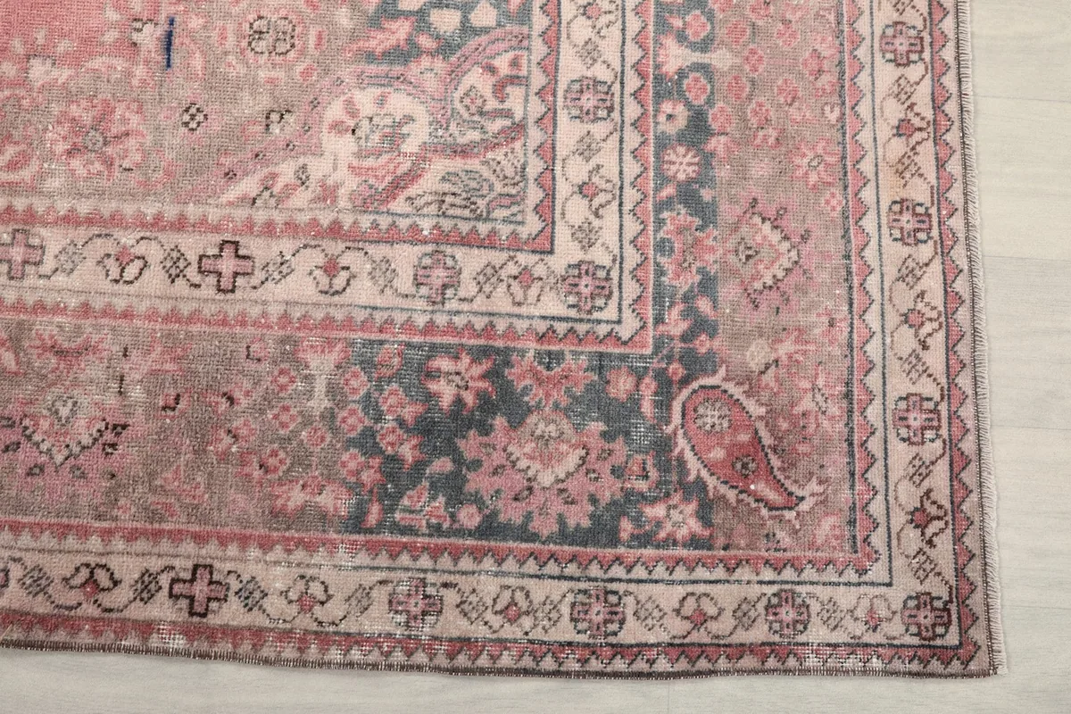 Detail of the navy border with intricate floral and paisley designs