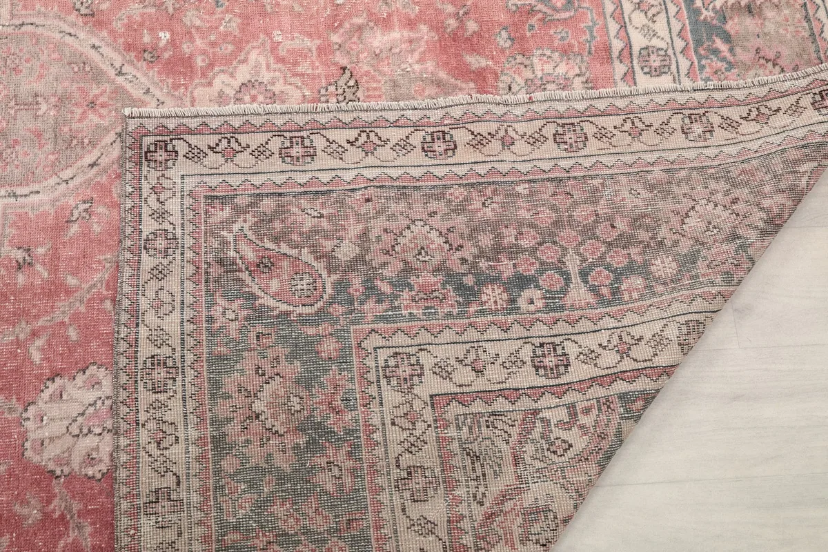 Another view of the rug's reverse side, revealing the tight hand knotting and foundation