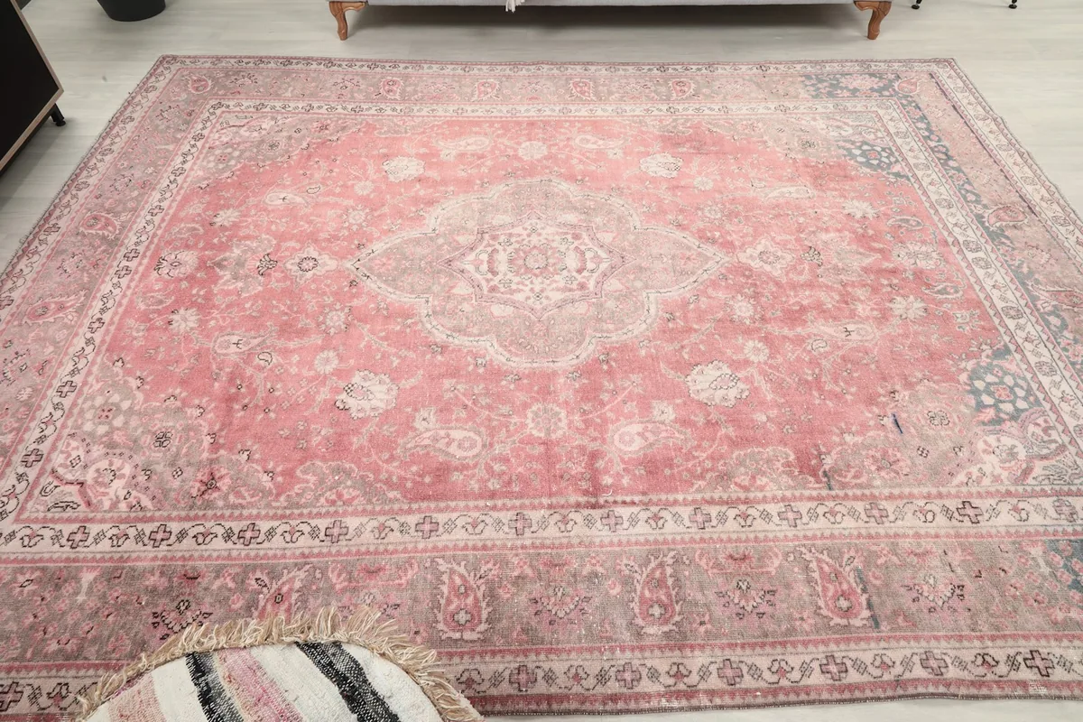 Overhead view of the rug in a room, showcasing its full design and dimensions