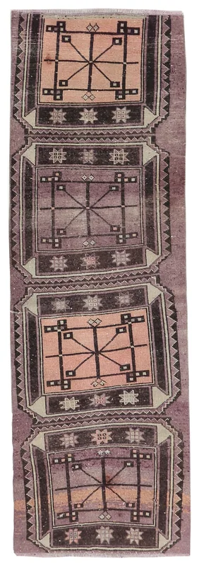 Full top view of the vintage Anatolian runner rug with rose and purple geometric patterns