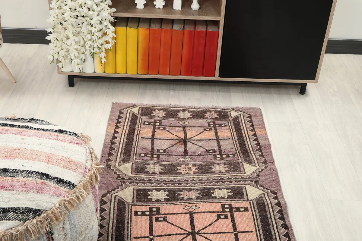Overhead view of the runner rug in a room setting, focusing on the pattern repeat
