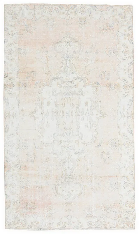 Full overhead view of the 5x9 vintage Anatolian rug with a faded rose and beige palette.