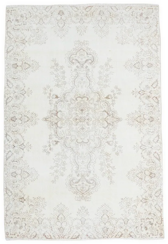 Full top view of the ivory and beige floral medallion vintage Anatolian rug