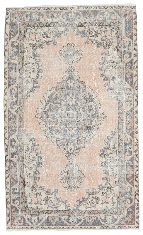 Full overhead view of the 3'9" x 6'1" rose and gray medallion vintage Anatolian rug