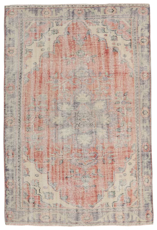 Full top view of the rose and gray vintage Anatolian rug on a white background