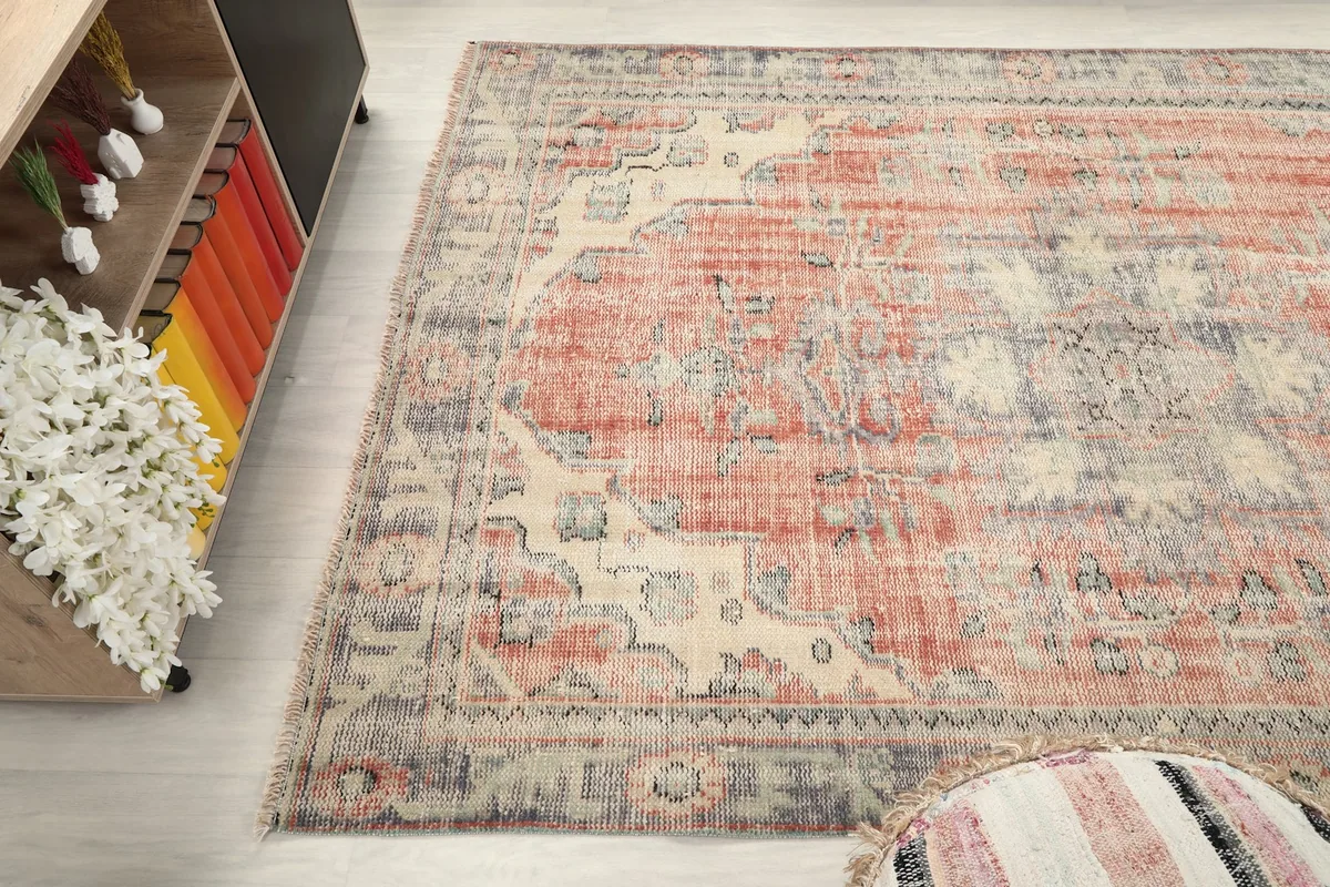 High angle shot of the vintage Anatolian rug, showcasing its full design and colors