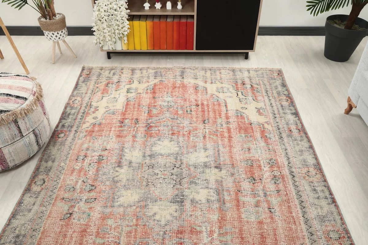 View of the vintage Anatolian rug from the opposite end in a living room setup