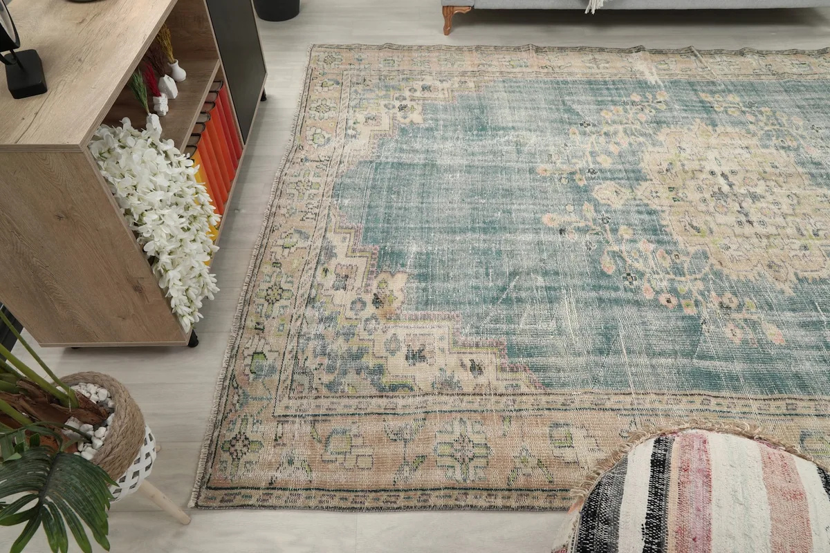 Another angle of the blue and beige rug complementing modern furniture