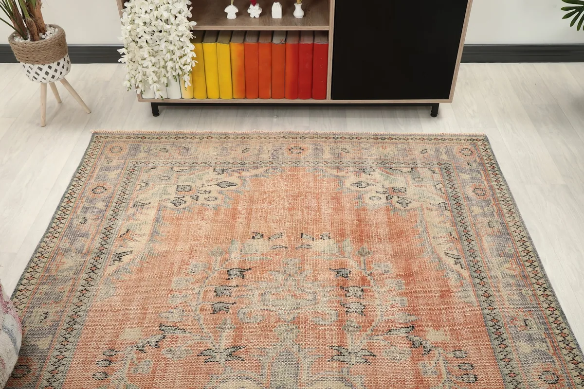 Overhead view of the rug, emphasizing its shape and the central medallion design