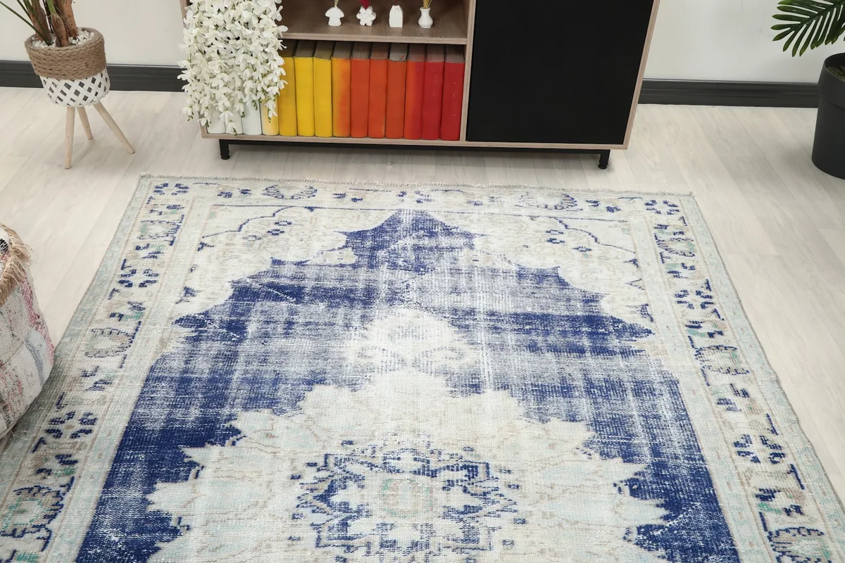 Overhead view of the rug in a room, highlighting its placement and scale