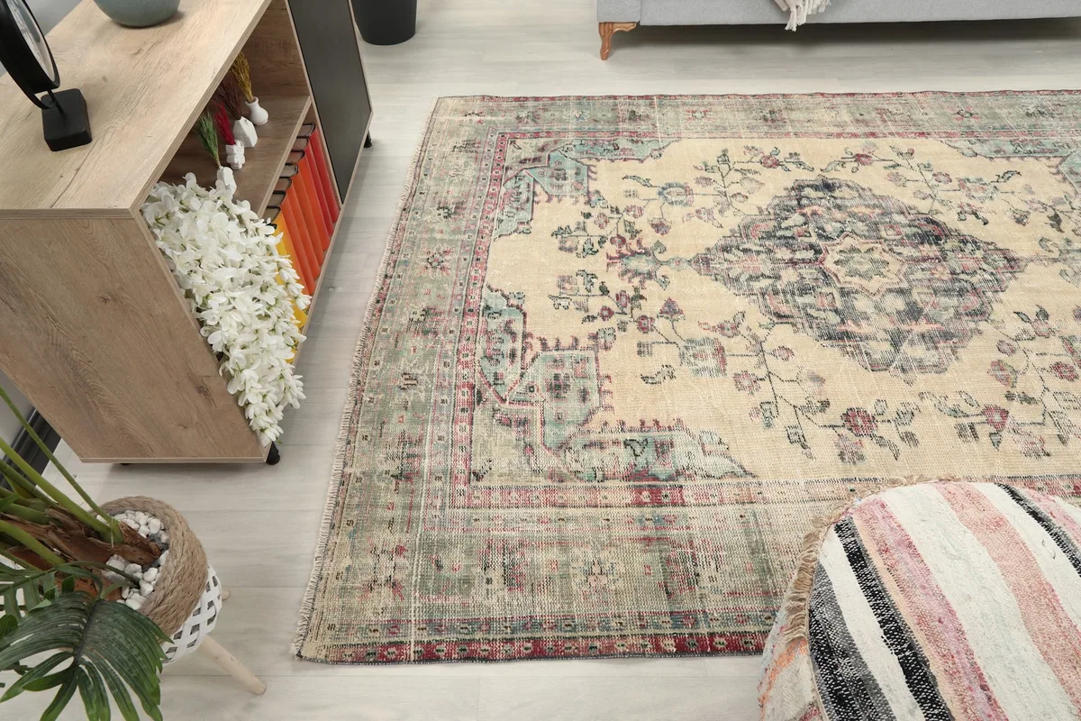 Angled shot of the rug in a room, showing its overall size and how it complements the decor.
