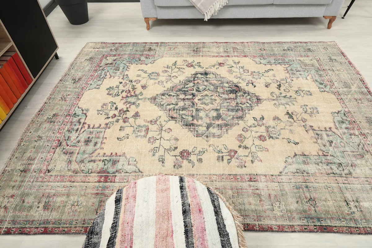 Overhead view of the rug in the room, providing a clear perspective of the entire pattern.
