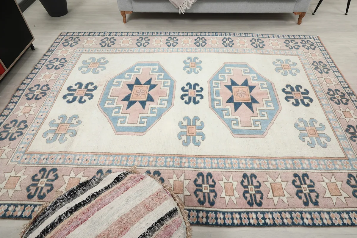 Full overhead view of the rug in the room, showcasing its symmetrical design.