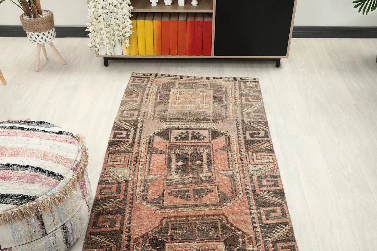 Angle shot of the runner rug extending into a room, highlighting its length and design