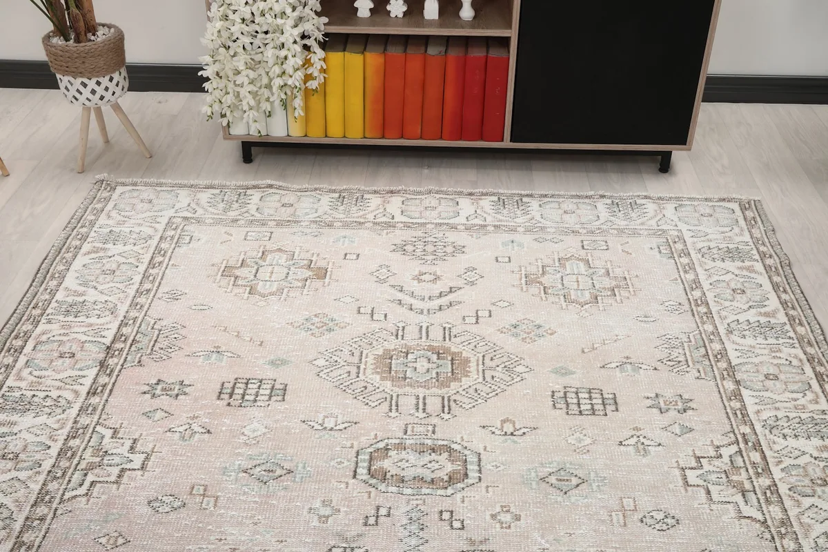 Overhead view of the rug's top half in a room setting